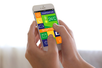 Using smart home app on phone. Smart home control concept.