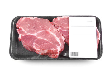 Packed pieces of pork meat, isolated on white