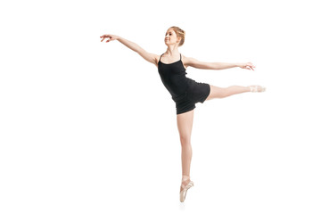 Obraz premium Young ballet dancer in mid air