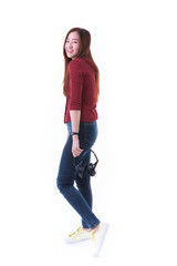 Young Asian student isolated on white background.