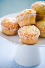 Lemon muffins stack on serving platter