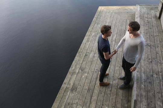 Young men at jetty