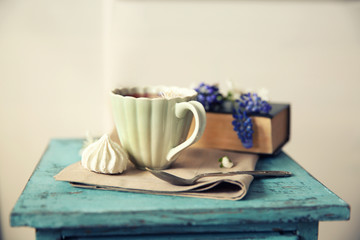 Cup of tea on wooden stool