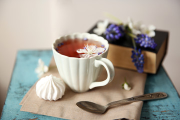 Cup of tea on wooden stool