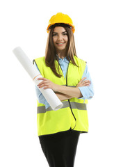 Female engineer in vest and helmet holding rolled blueprint isolated on white