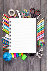 Office supplies on wooden desk