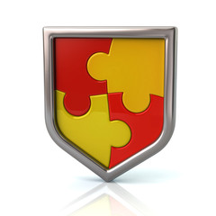 Shield with red and yellow puzzle pieces