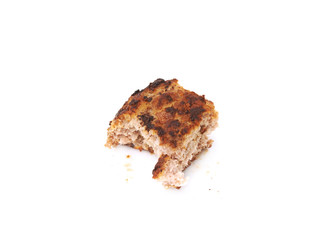 Fototapeta premium Bitten single small hand made cutlet isolated over white background