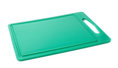 Unused plastic green cutting board isolated over the white background