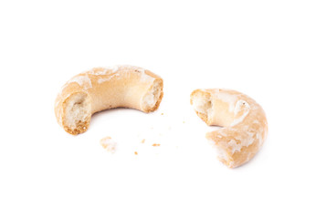 Broken into pieces dry cake sushki cookie isolated over the white background