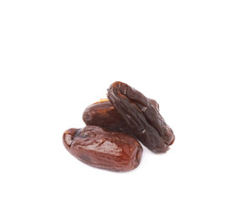 Pile of date fruits over isolated white background surface