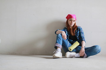 woman wall building repairs