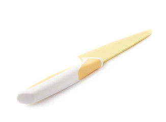 Steel yellow knife isolated over the white background