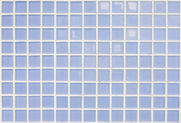 Closeup surface of blue glass tile at the temple wall texture background