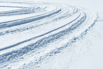 Fototapeta na wymiar snowmobile trail in winter