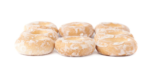 Pile of small cakes with hole isolated over the white background