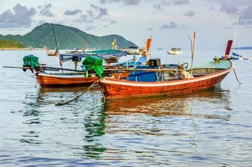 Naklejka na ściany i meble Anchored long-tail boats, Phuket, Thailand