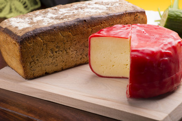 homemade bread, cheese, tomato and cucumber sandwich on set