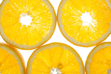 segments of orange are isolated on white