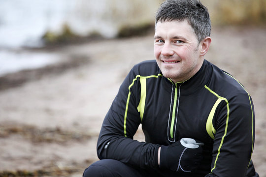 Portrait of smiling man in sport clothes