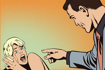 The men is pointing at the frightened woman.