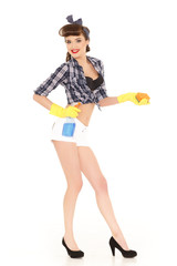 Young woman with spray bottle and sponge.