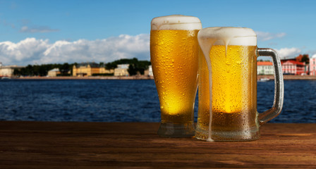 excellent beer on a city background