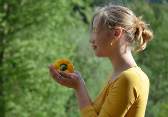 girl with yellow pepper