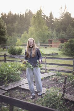 Teenage girl in garden