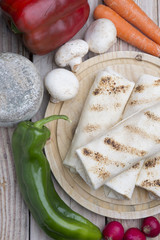 tortilla wraps with meat and vegetables