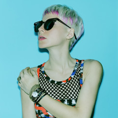 Fashion blond girl with stylish hairstyle and fashion accessorie