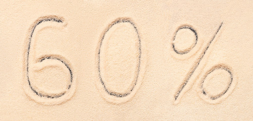 60 % lettering written on beach sand