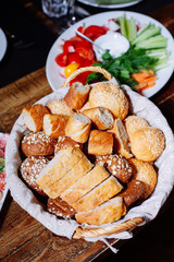 Bread in basket on the banquet table