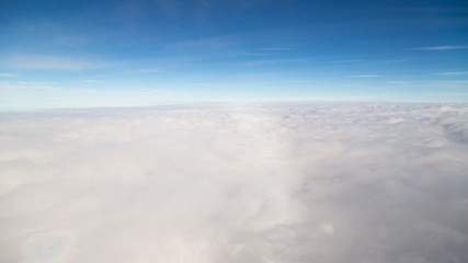 blue sky high view from airplane clouds shapes
