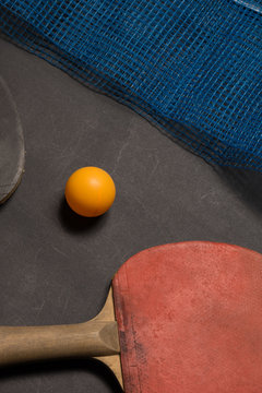 Old pingpong paddles and ball.