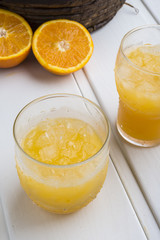 Naklejka na ściany i meble Orange juice ice