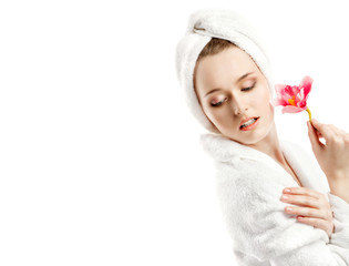 Young Beautiful Woman in White Terry Dressing Gown with Orchid a