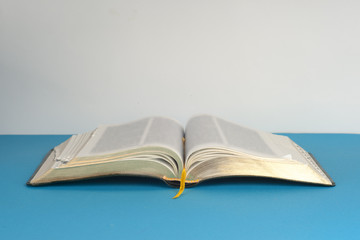 Open book on light table. Back to school. Copy space