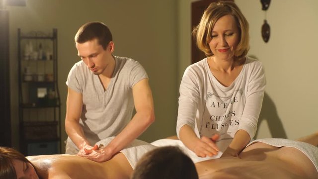 young couple doing a back massage