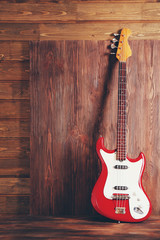 Fototapeta premium Electric guitar on wooden background