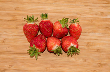 fresh strawberries on the wooden table