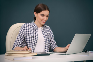 Woman using graphic tablet at office