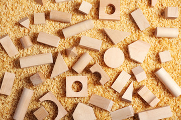 Wooden kids toys on carpet
