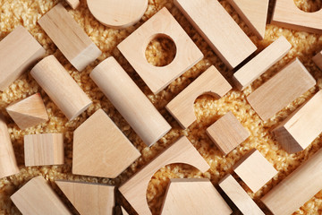 Wooden kids toys on carpet