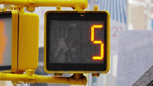 Close up on traffic semaphore, red, counting from 10 to 0