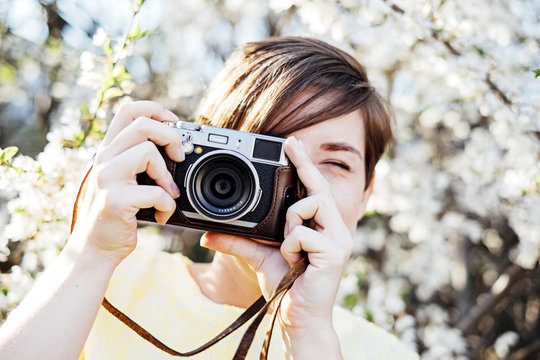 Young woman taking picture