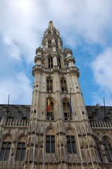 Fototapeta na wymiar Tower of Grand Palace or Grote Markt in the central square of Brussels
