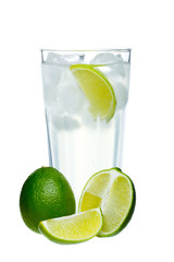 Mojito glass with sliced lime on white background