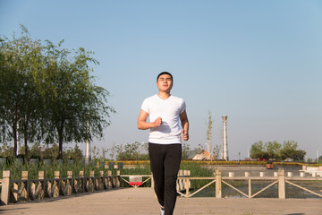 Young Asian man in the running