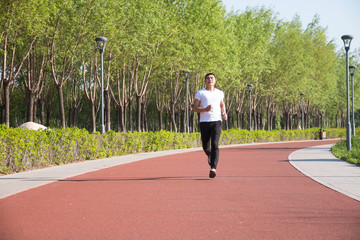 Young Asian man in the running